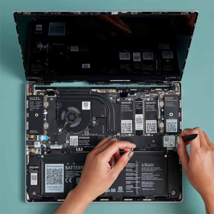 A standard Framework laptop with its top keyboard cover removed