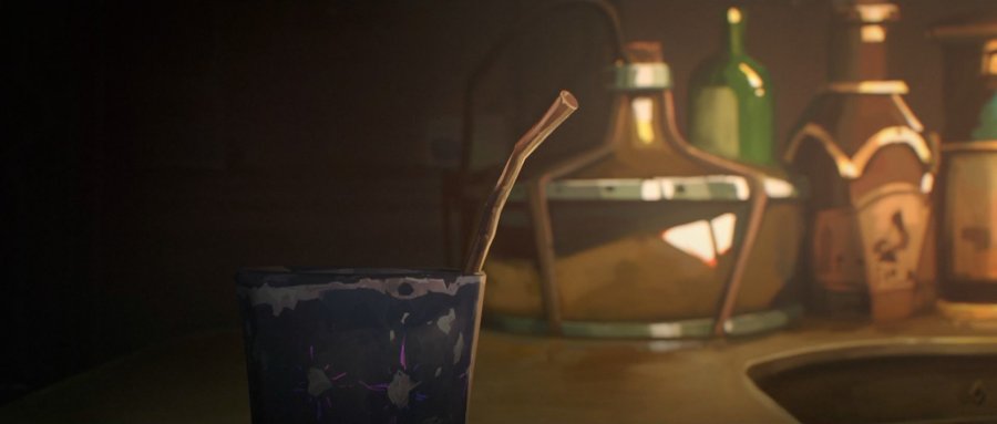 A chipped dirty cup with a bent straw